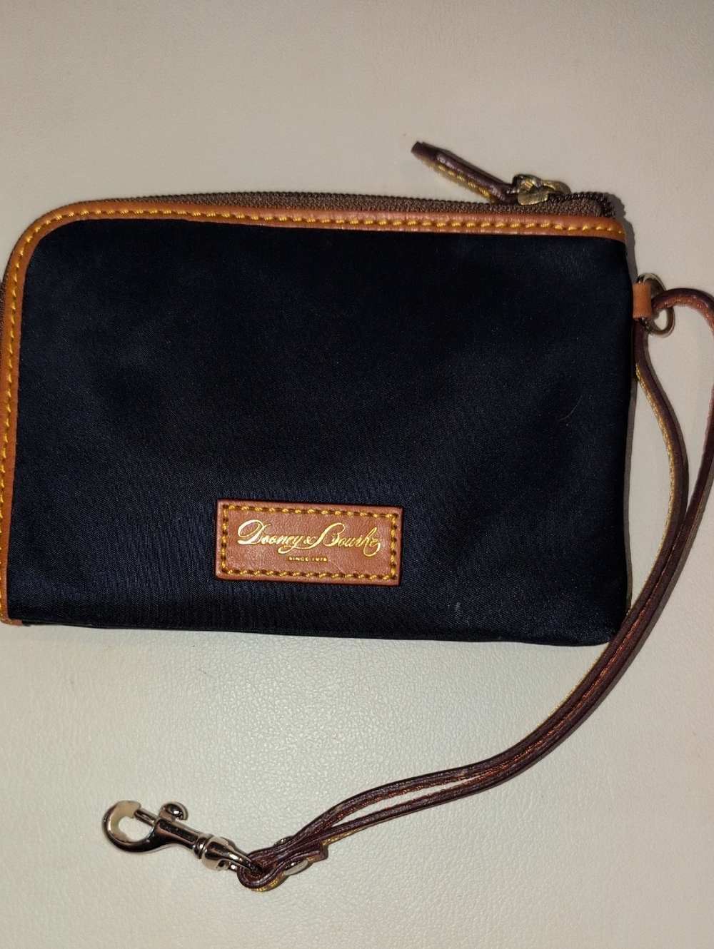 Dooney & Bourke Navy Blue Wristlet with Brown Leather Trim